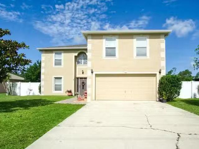 Inviting, Spacious, Secure & Homey Palm Coast Home with Pool..