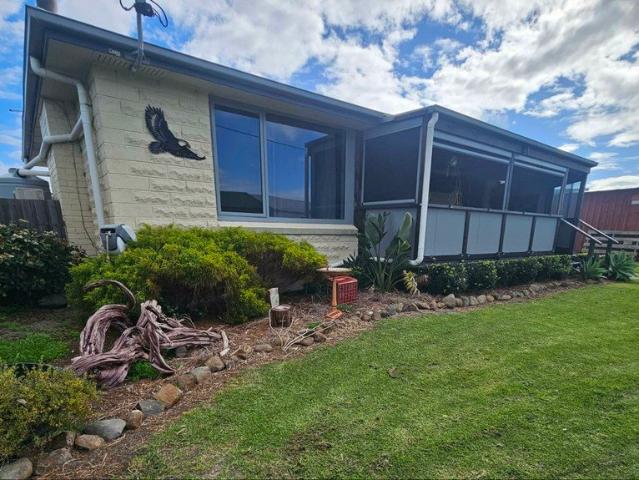 Island Living Just Steps from the Beach
