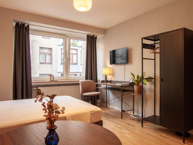 JM BOUTIQUE: Designer Studio in the Heart of Medienhafen, Dusseldorf Amsterdam Apartments for Rent