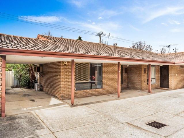 Just Listed! Low Maintenance Living Close to Everything