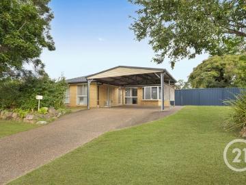Neat & Complete 4 Bedroom Home with Covered Outdoor Entertaining Area