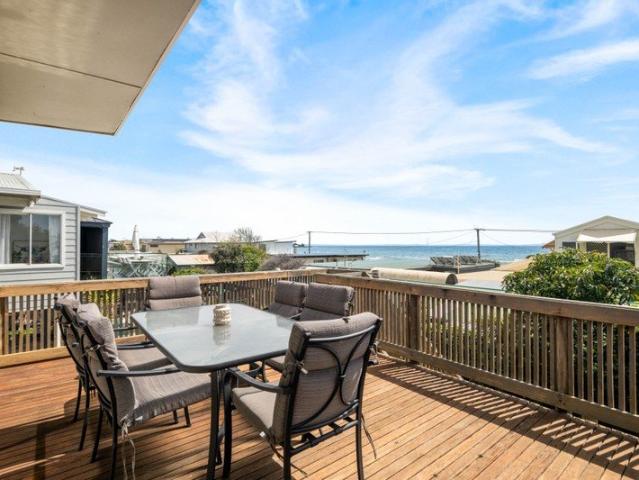 Just Steps from the Beach with Stunning Bay Views