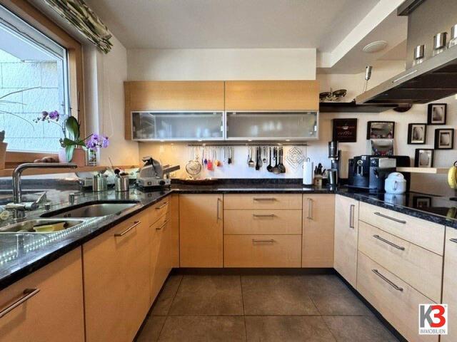 K3 Exklusiv und großzügig wohnen nur wenige Minuten vom Wallersee entfernt! Eckreihenhaus mit Wintergarten in herrlicher Ruhelage!