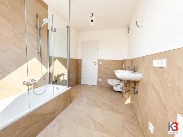 K3 Mattsee Modernisierte Dachgeschosswohnung inkl. Carport – Wohnen mit Charme!