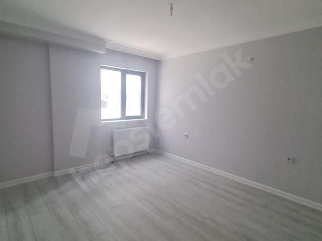K.ESAT BÜLBÜLDERESİ CADDESİNDE YENİ BİNA 2+1 ÖN GİRİŞKATI