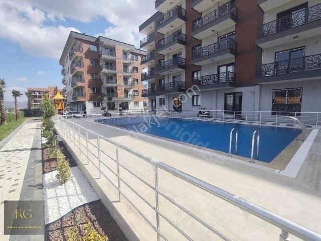 Kıran Gayrimenkulden Havuzlu Sitede Satılık 2+1 Ara Kat Daire
