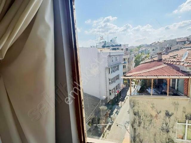 Kısmi Deniz Manzaralı Çarşı Merkezde 3+1 Daire