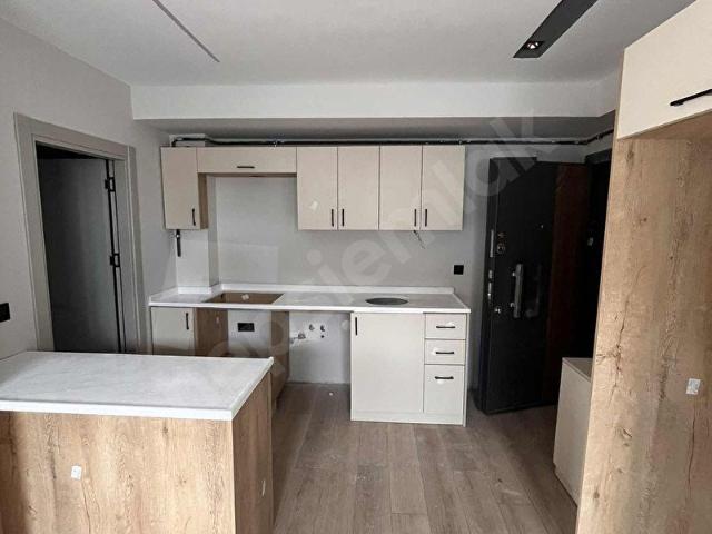KAŞIKCIBAĞLARINDA SIFIR 1+1 LÜKS SATILIK DAİRE