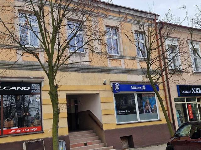 Kamienica przy rynku z 2 lokalami i 4 mieszkaniami