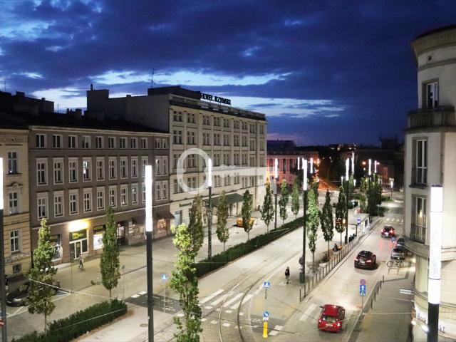 Kamienica z duszą, panoramiczny widok na Bibliotekę zapraszam