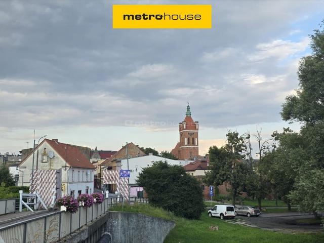 Kamienica z lokalami i ogrodem nad Drwęcą w Golubiu