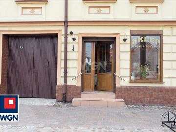 Kamienica z lokalem usługowym i garażem w Rawiczu