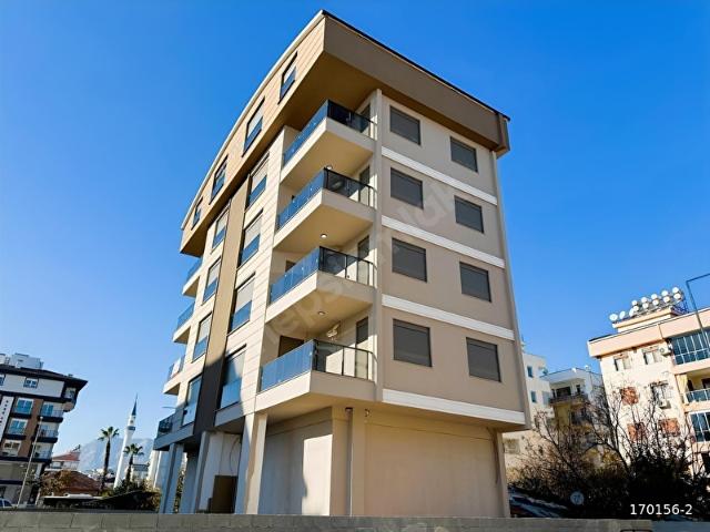 KAAN'dan. BAHÇEYAKA'DA 2+1 2. KAT'DA CADDE YAKINI SIFIR DAİRE.