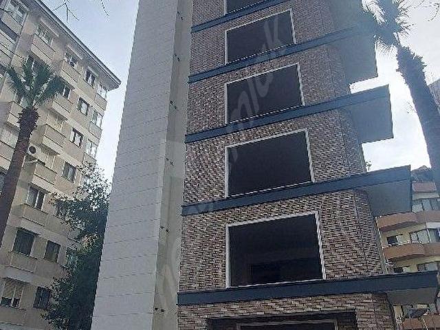 Kalamış yeni sıfır daire 3+1 balkonlu kısmi deniz manzaralı