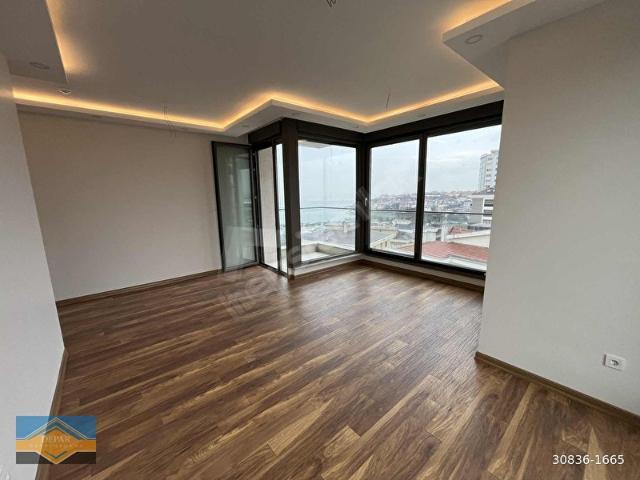 KALAMIŞTA SIFIR BİNADA DENİZ MANZARALI 3+1 GÜVENLİKLİ BALKONLU