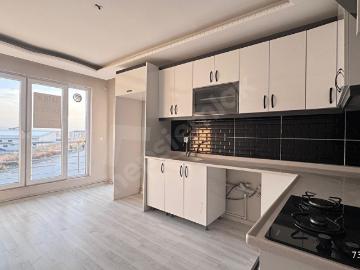 KALECİK EMLAK'TAN YENİ BİNADA ORTA KAT ASANSÖRLÜ EBEVEYN B. 3+1