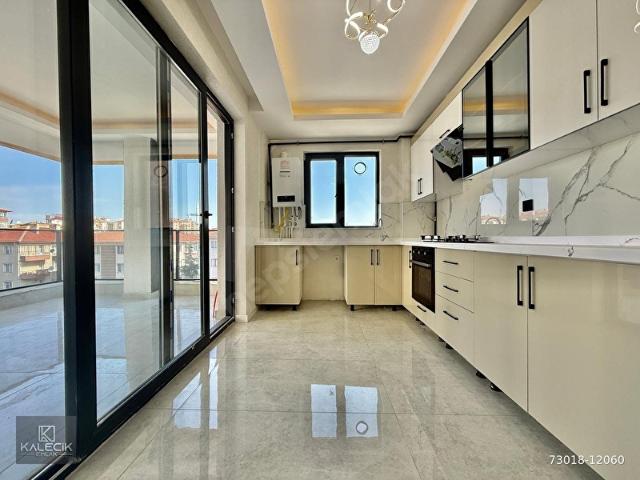 KALECİK EMLAK'TAN LÜKS SİTEDE SIFIR Y. ISITMA E.BANYO GENİŞ BALKONLU 2+1 4.KAT