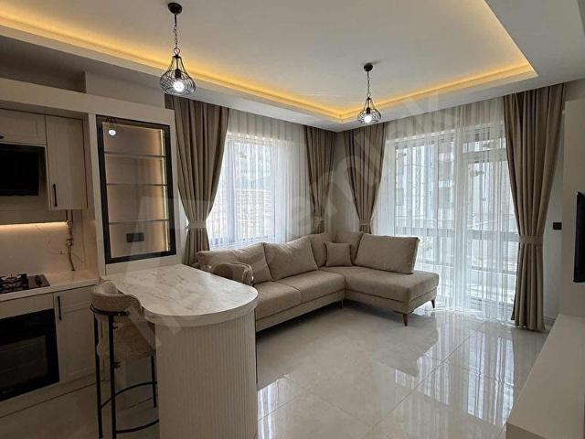 KALKAN'DAN UYDUKENTTE 2+1 ULTRA LÜX EŞYALI SATILIK DAİRE