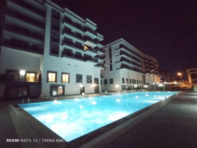 Kapalı Otopark Asansör Cambalkon Yerden Isıtma Havuzlu Site