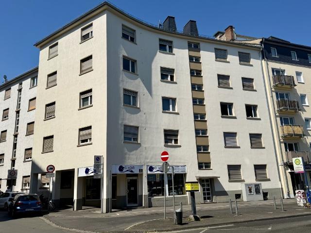 Kapitalanlage mit Entwicklungspotenzial Mehrfamilienhaus mit Ladengeschäft in zentraler Wohnlage