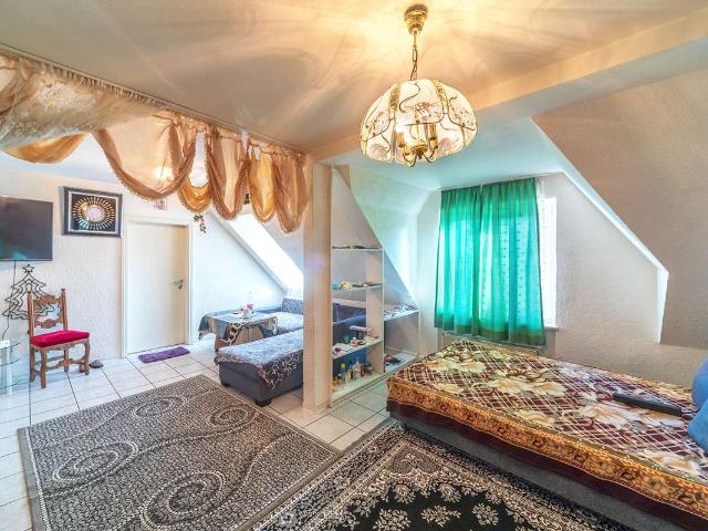 KAPITALANLAGE ODER EIGENNUTZ! 3 Zimmer Wohnung + 3 Garagen in Ginsheim Gustavsburg