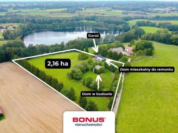 Unikalna działka 2,16 ha z jeziorem i domami w Karwi