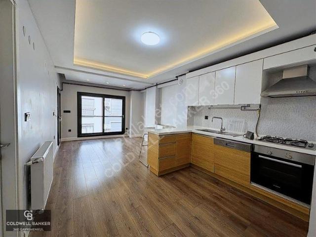 Karşıyaka Aksoy'da, Merkezi Konumda, Yeni, Ara Kat 1+1 Satılık