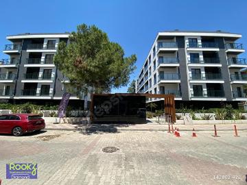Karşıyaka Bostanlı Sıfır Bina Deniz Manzaralı Kiralık 1+1 Daire