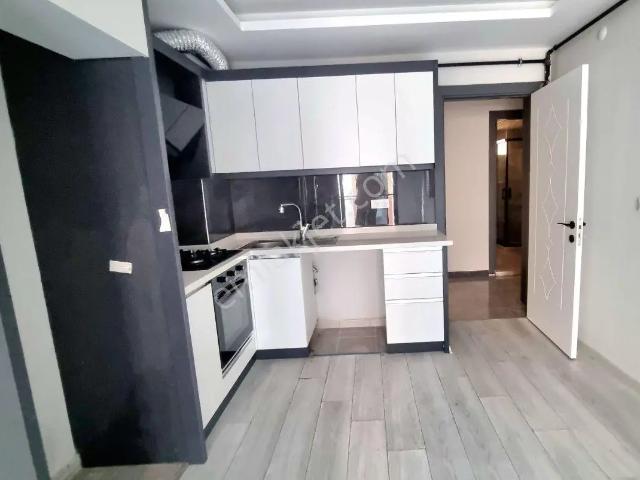 Karşıyaka Nergiz'de 2 Yıllık Binada Satılık 1+1 Daire