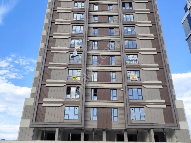 Karşıyaka'da Kiralık Sıfır Eşyalı 1+1 Ara Kat Daire