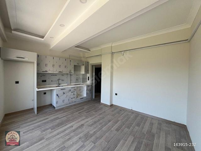 KARACA'DAN ORTACAMİ MAHALLESİ'NDE 2+1 DENİZ GÖREN SIFIR DAİRE