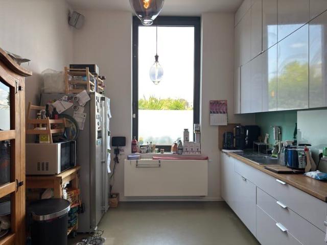 Karaktervolle rijwoning met stadstuin en drie slaapkamers.
