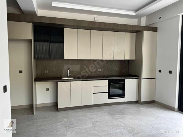 KARAKUŞ'TAN SÜPER LÜKS YAPI,YERDEN ISITMA,CADDE ÜZERİ 2+1 DAİRE