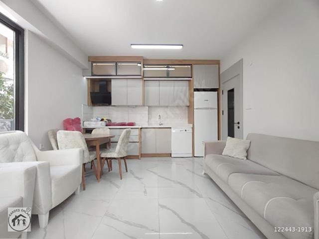 KARDEŞTEN ALTINKUMDA MÜSTAKİ EV HAVASINDA DENİZE 50 MT. DOĞALGAZLI YÜKSEK GİRİŞ SIFIR 1+1 LÜKS DAİRE