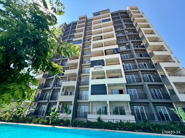 KARGIPINAR'INDA SİTE İÇİ FULL EŞYALI HAVUZLU 1+1 SATILIK DAİRE