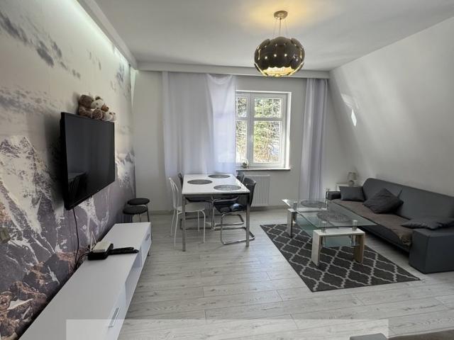 Dwupoziomowy apartament 120 m2 z garażem i komórkami