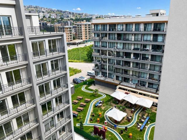 Katip Çelebi Üniv. Karşısında Site İçerisinde Satılık 1+1 Daire