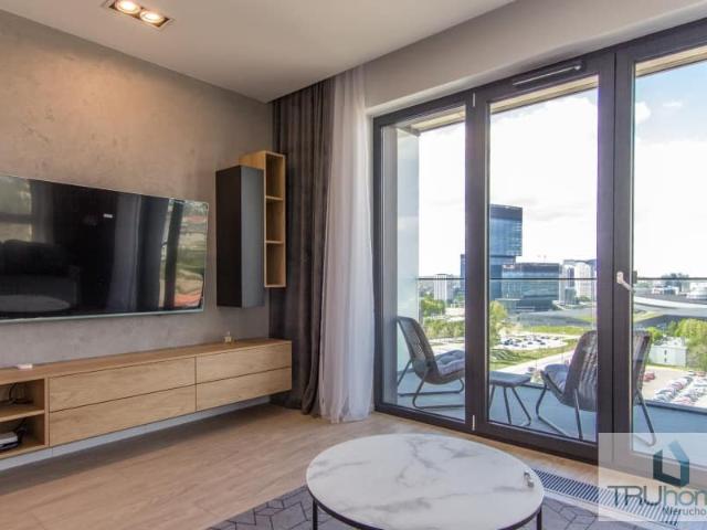 Wynajmę nowoczesny 3 pokojowy apartament z tarasami i garażem