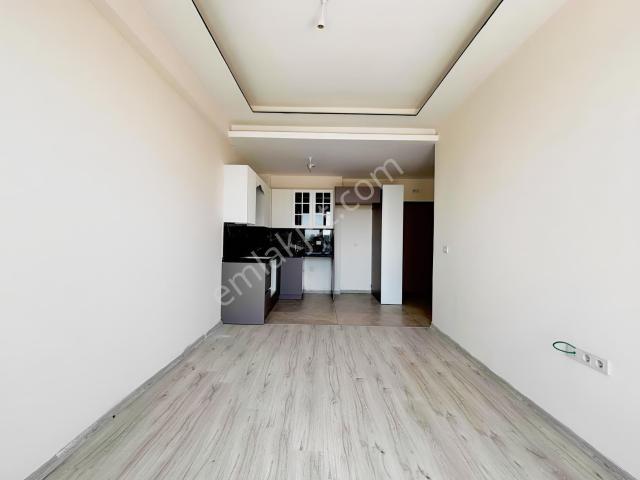 Kaynar Gayrimenkul'den Çeşmelide Ferah Sıfır 1+1 Daire