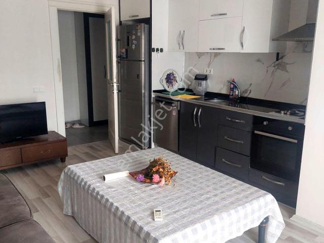 Kazanç Gayrimenkul'den Yenişehir Akkent Mahallesi'nde Kiralık 1+1 Full Eşyalı Daire