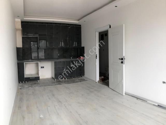 Kepez Sütçüler'de,yüzme Havuzlu Sitede,yatırımlık Sıfır 1+1 Giriş Katı