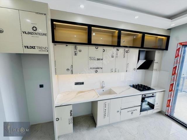 Kerim'den Küçükkuyu Merkez'de 2+1 Ebebyn Banyolu Kiralık Daire