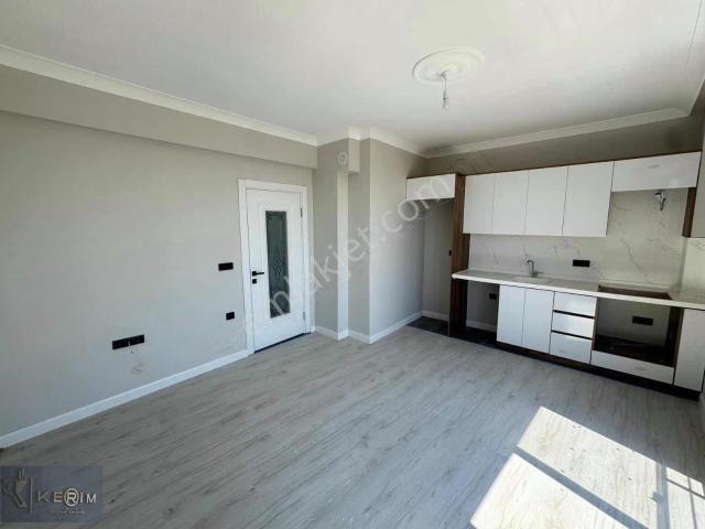 Kerim'den Küçükkuyu'da Deniz Manzaralı 1+1 Kiralık Daire