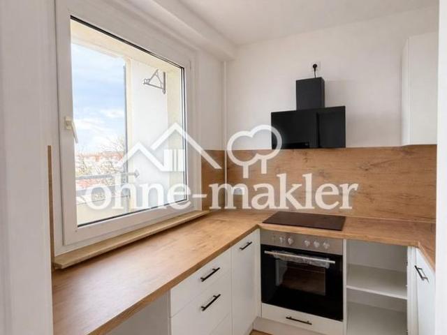 Kernsanierte 3 Zimmer Wohnung mit moderner Einbauküche in zentraler Lage
