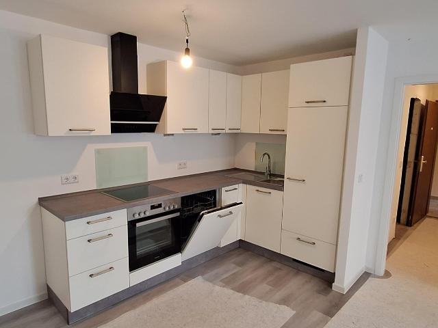 Zukunftssichere Wohnung ohne Sanierungsstau mit Balkon, Tiefgarage und neuer Markenküche