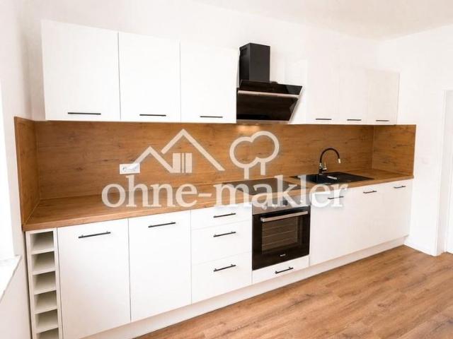 Kernsanierte 4 Zimmer Wohnung mit moderner Einbauküche in zentraler Lage