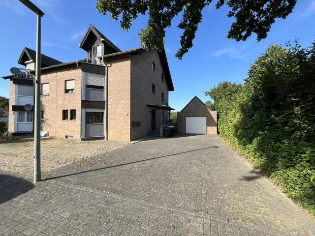 Kernsanierte Gartenwohnung mit Terrasse, Einbauküche und Garage in gefragter Lage von Erkelenz
