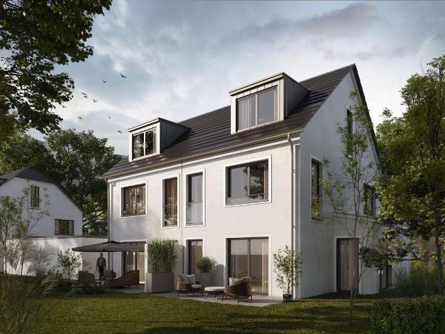 KfW40 QNG Doppelhaushälfte mit klassischer Architektur und modernen Ambiente im grünen Aubing