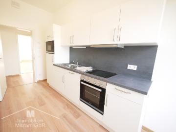 KFW40/Neubau/2 Zimmer DG Whg. mit EBK u. hochwertiger Ausstattung in Zentrumslage