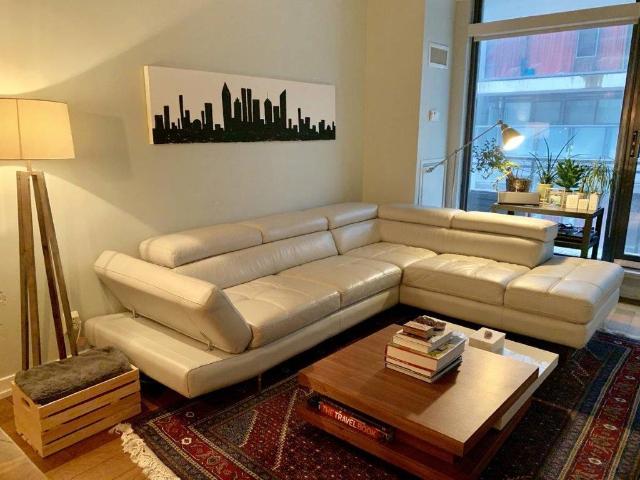 King West Toronto Furnished Condo Rental at Fashion District Lofts – Spacious 1 Bedroom plus Den with Balcony and Hardwood Floors